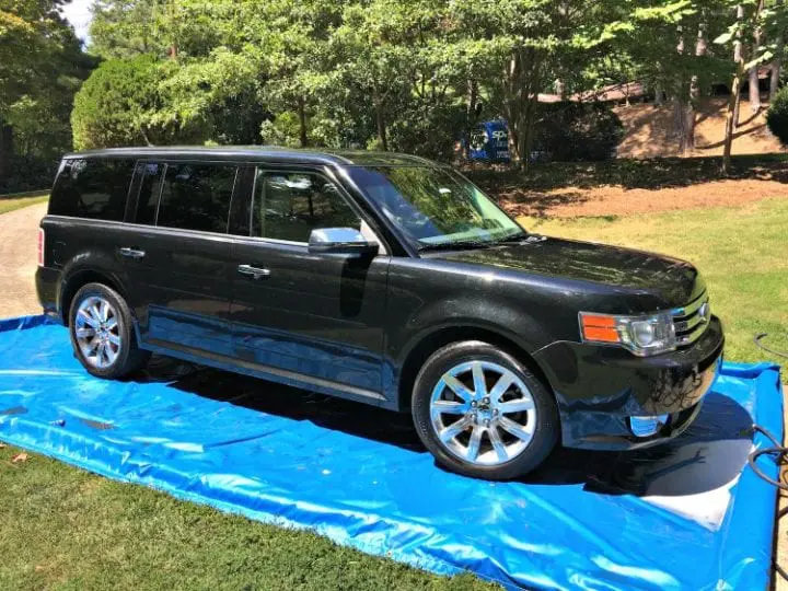 ford flex getting ready to be cleaned in driveway