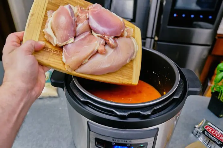 Add the all of the chicken and shut off the saute function on the pressure cooker Step 5