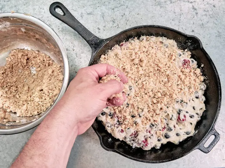 Cast Iron Cherry Blueberry Bread with Crumb Topping - Top Batter with crumb