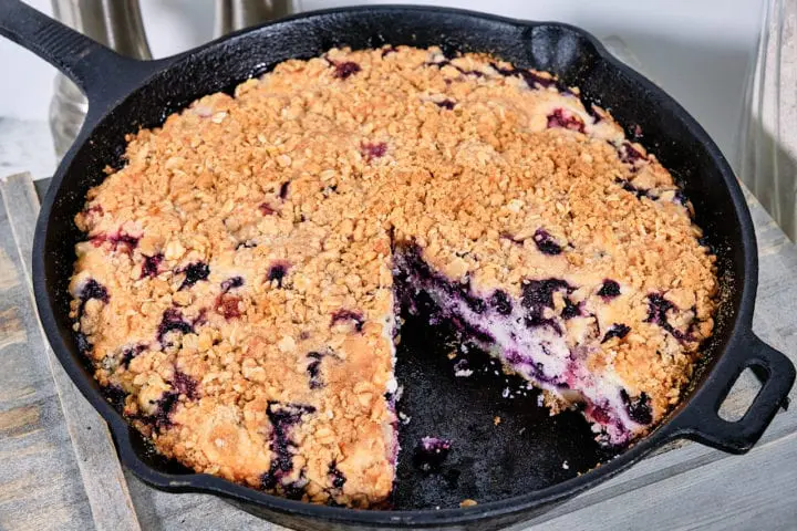 Blueberry and Cherry Crumble - Cake with piece removed