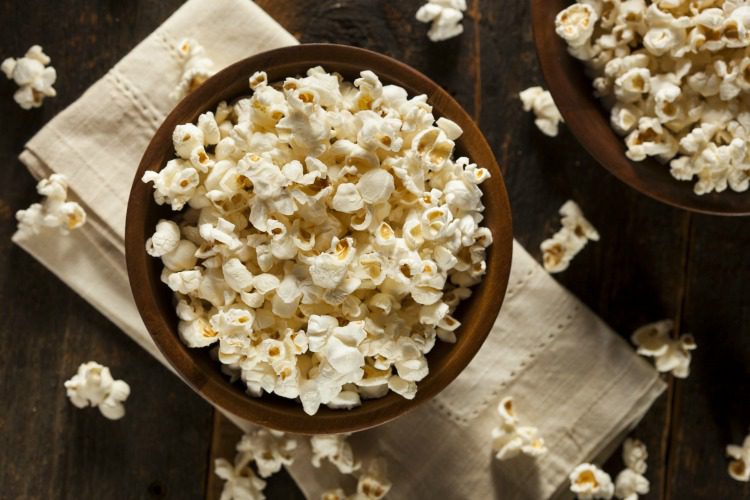 Healthy Buttered Popcorn with Salt in a Bowl