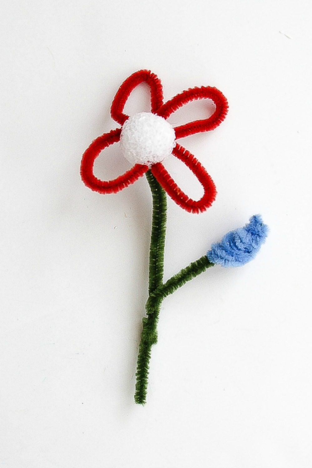 How to make spring flowers using pipe cleaners and foam balls.