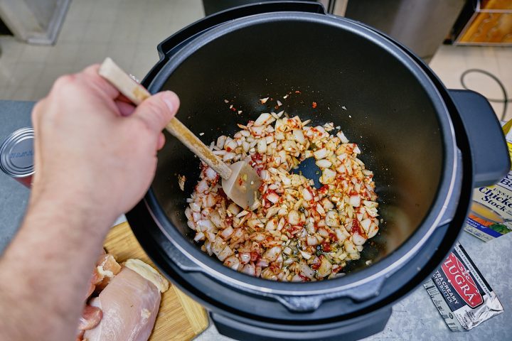 Add the chopped medium onion, garlic, dry oregano, and tomato paste. Saute until the onion begins to soften and turn translucent Step 2