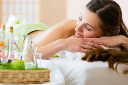 Young woman relaxing in a spa