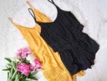 Orange and black romper, peonies on white fur Fashionable concept