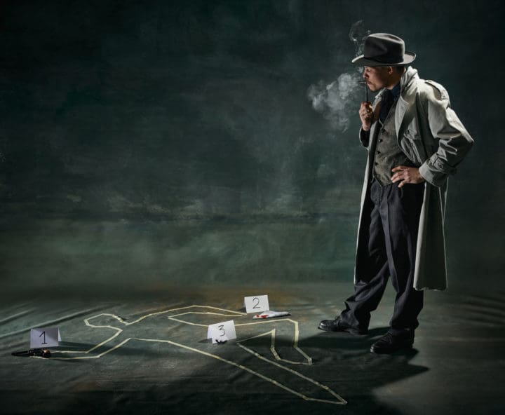 Portrait of man, detective in trench coat standing near human drawn silhouette on floor and smoking pipe over vintage dark green background
