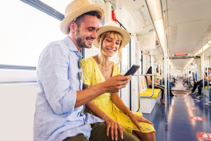 Couple travelling in the subway