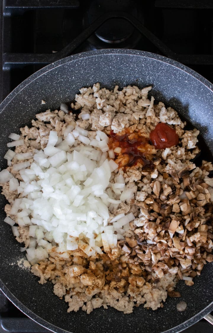 Skillet Cooking with Sauce and Onions