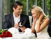 Man holding box with ring making propose to his girlfriend
